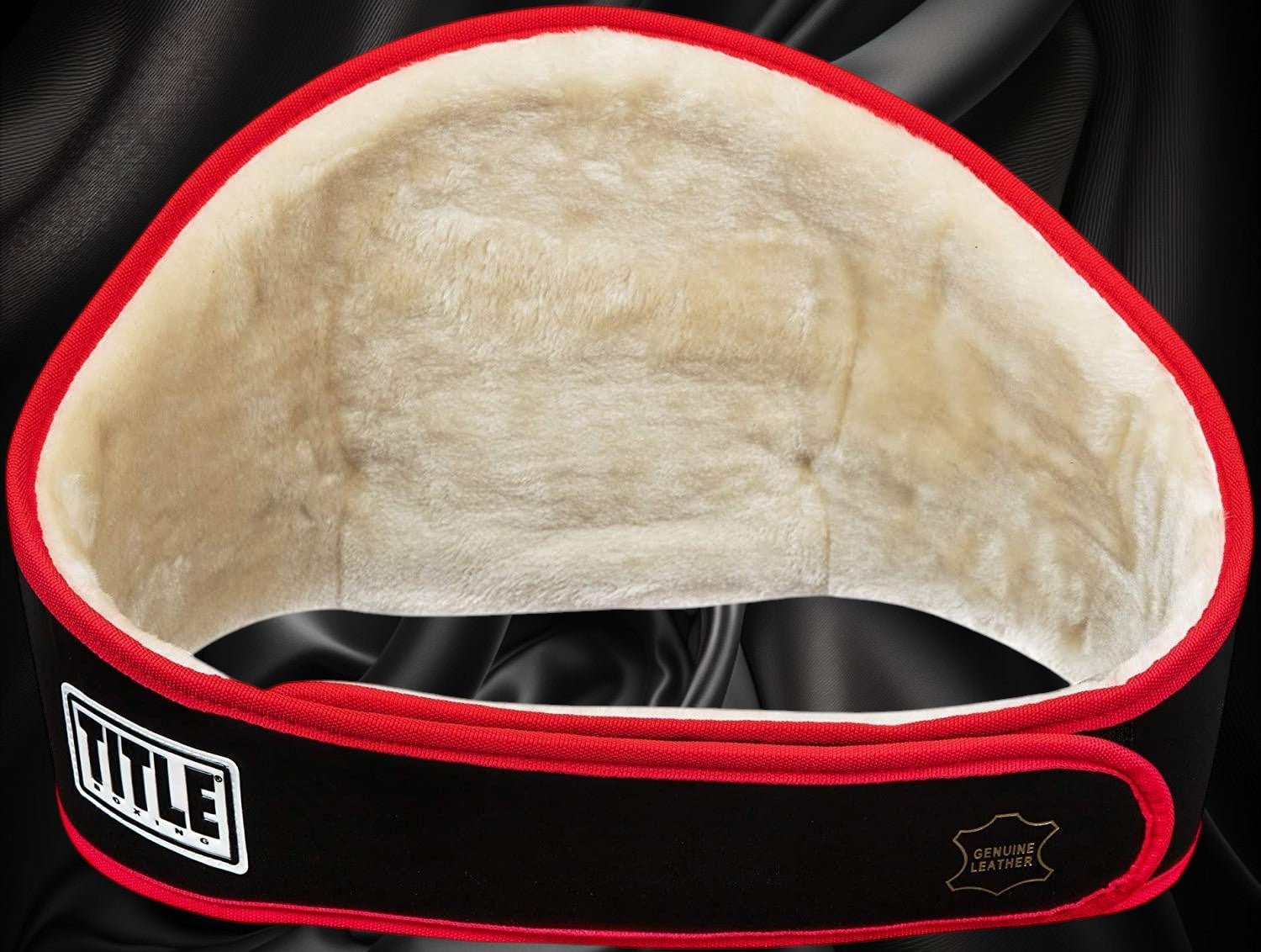 ottoman-belts-boxing-championship-belt Ottoman Belts TITLE BOXING Force of One championship belt with black leather exterior and soft cream faux fur lining.